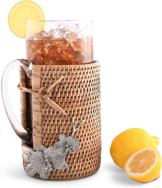 Vagabond House Orchid Adorned Glass Carafe, Lightweight & Durable, Tropical Rattan Wicker Design, Dishwasher Safe, Perfect Table Centerpiece, Ideal Ice Tea Pitcher for Hot or Cold Beverages