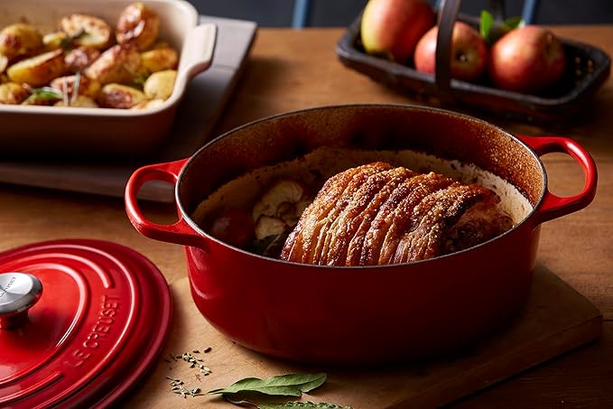 Le Creuset Enameled Cast Iron Signature Oval Dutch Oven, 9.5 qt., Cerise