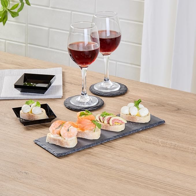 Restaurantware Slate Serving Trays 4 Pack of 11.8" x 4" Foam Feet Charcuterie Stone Plates Rustic Edges Freezable Black Serving Display Cheese Boards for Kitchen, Gourmet, Dining, Parties